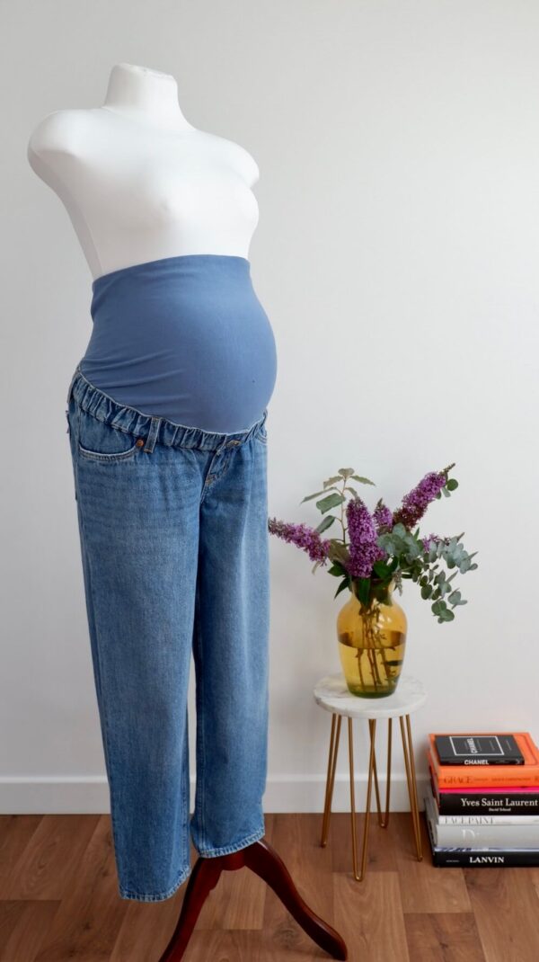 Image of maternity jeans on a pregnant mannequin