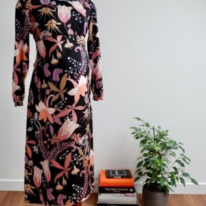 Full length image of H&M maternity pink and black floral patterned dress