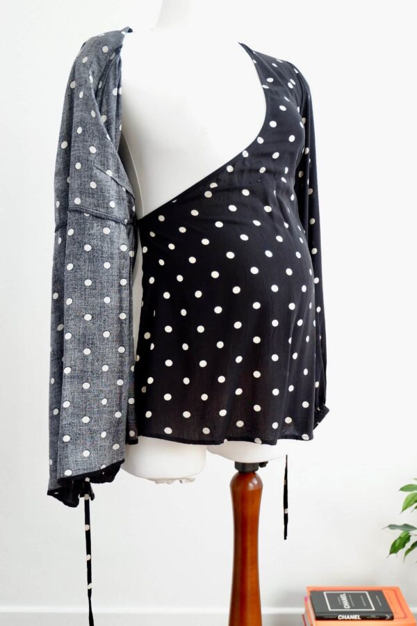 Image of H&M maternity black and cream polka dot maternity wrap top showing the inside wrap feature.